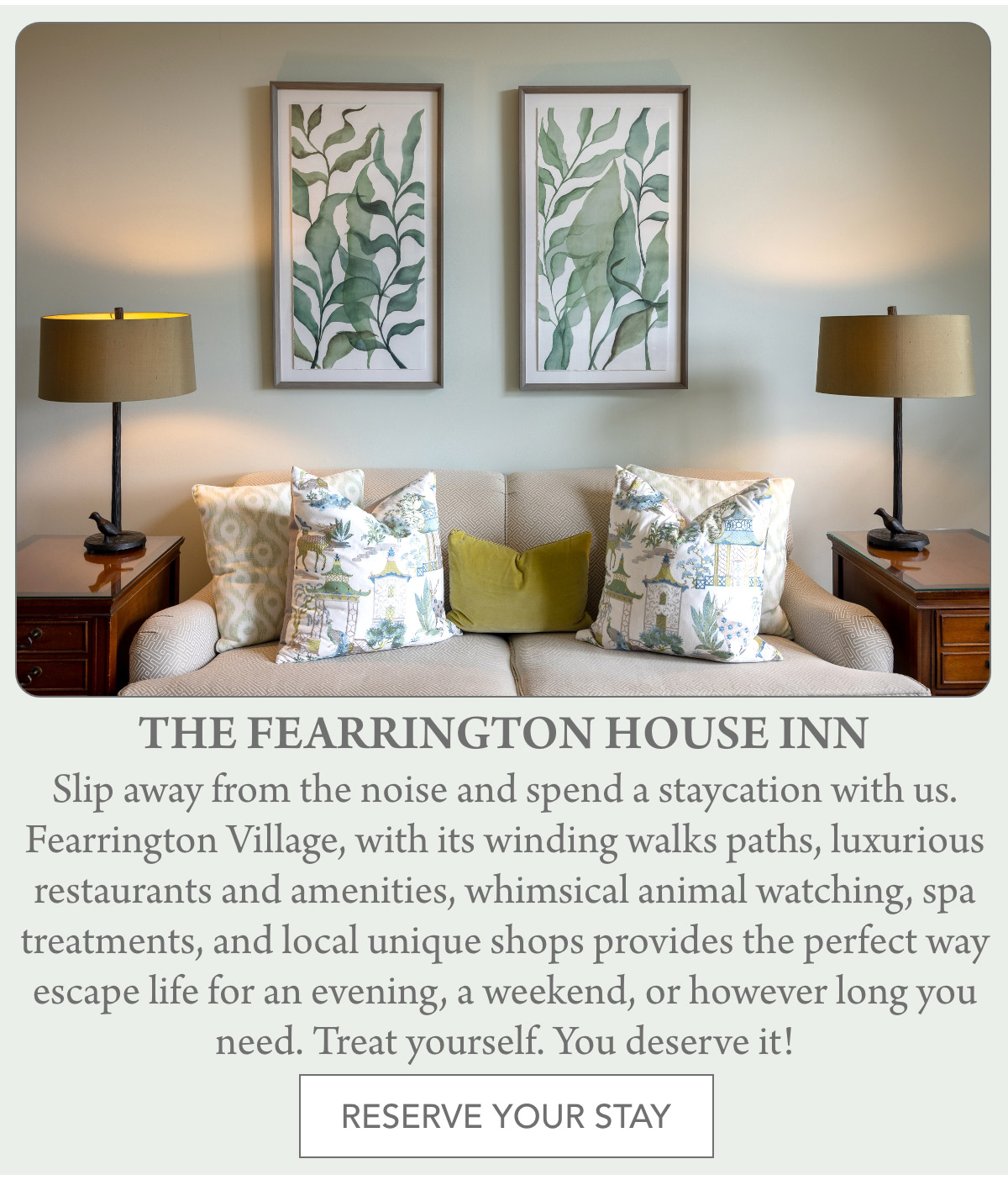 A cozy sitting area with a light sofa, patterned pillows, two side tables with lamps, and two framed botanical prints on the wall above. Text below invites guests to stay at The Fearrington House Inn. Fearrington Village