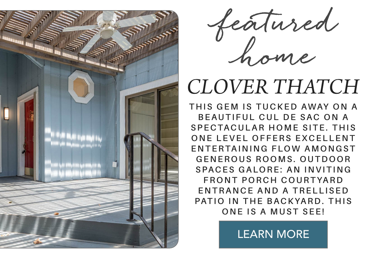 A covered front porch with blue siding, a white ceiling fan, a red door, and railing, with sunlight shining through a trellis. Text promotes a featured home called Clover Thatch with spacious indoor and outdoor areas. Fearrington Village
