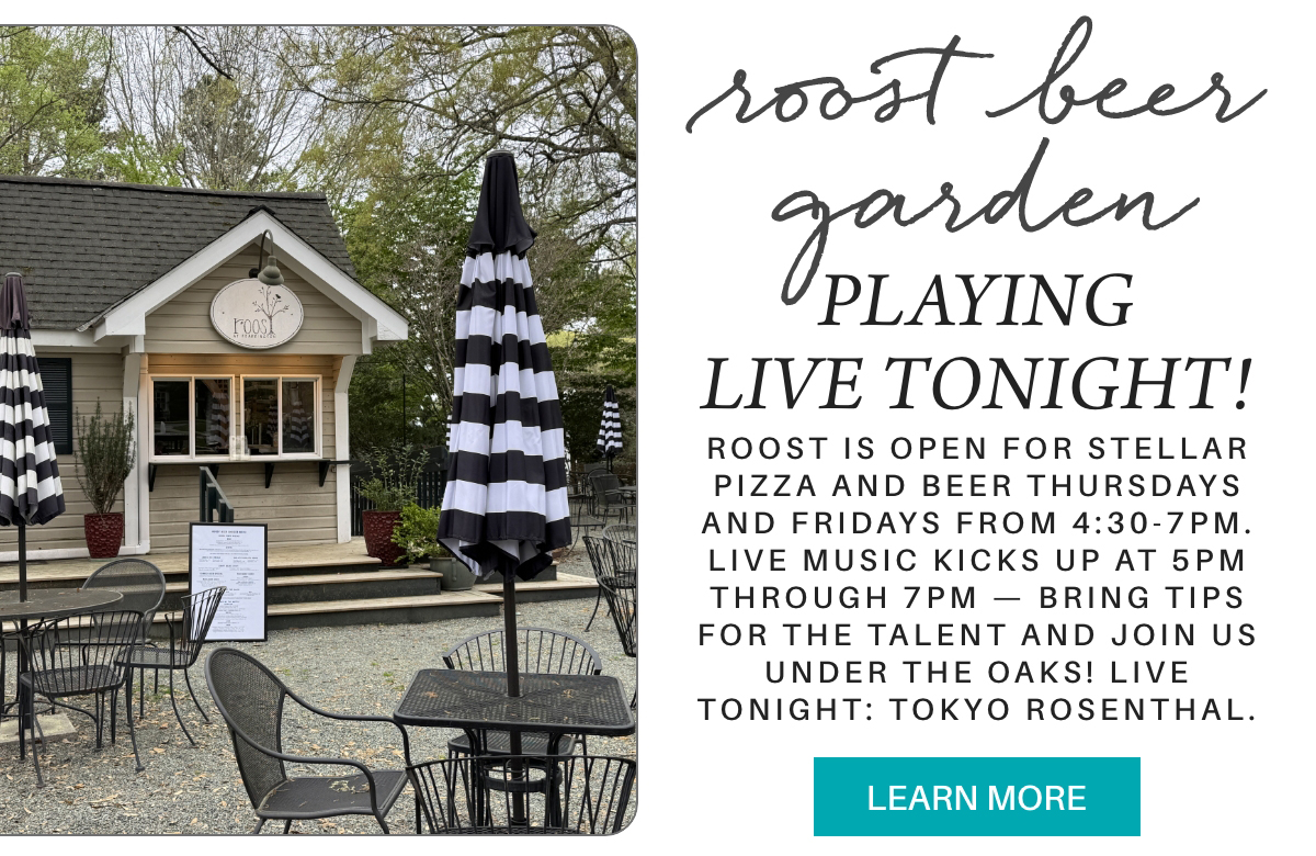 Outdoor seating at Roost Beer Garden, with black and white striped umbrellas and a cottage-style building. A sign advertises live music tonight featuring Tokyo Rosenthal, plus pizza and beer specials. "roost is open for stellar pizza and beer thursdays and fridays from 4:30-7pm. live music kicks up at 5pm through 7pm — bring tips for the talent and join us under the oaks! live tonight: tokyo rosenthal." Fearrington Village