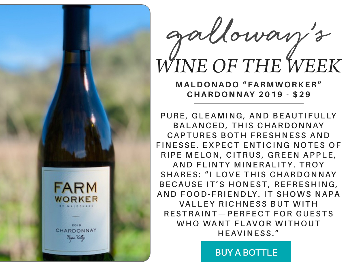A bottle of Maldonado “Farmworker” Chardonnay 2019 stands outside with a blurred natural background. Text describes it as the Wine of the Week with tasting notes and a blue “Buy a Bottle” button. "Maldonado “Farmworker” Chardonnay 2019 - $29: Pure, gleaming, and beautifully balanced, this Chardonnay captures both freshness and finesse. Expect enticing notes of ripe melon, citrus, green apple, and flinty minerality. Troy shares: “I love this Chardonnay because it’s honest, refreshing, and food-friendly. It shows Napa Valley richness but with restraint—perfect for guests who want flavor without heaviness.”" Fearrington Village