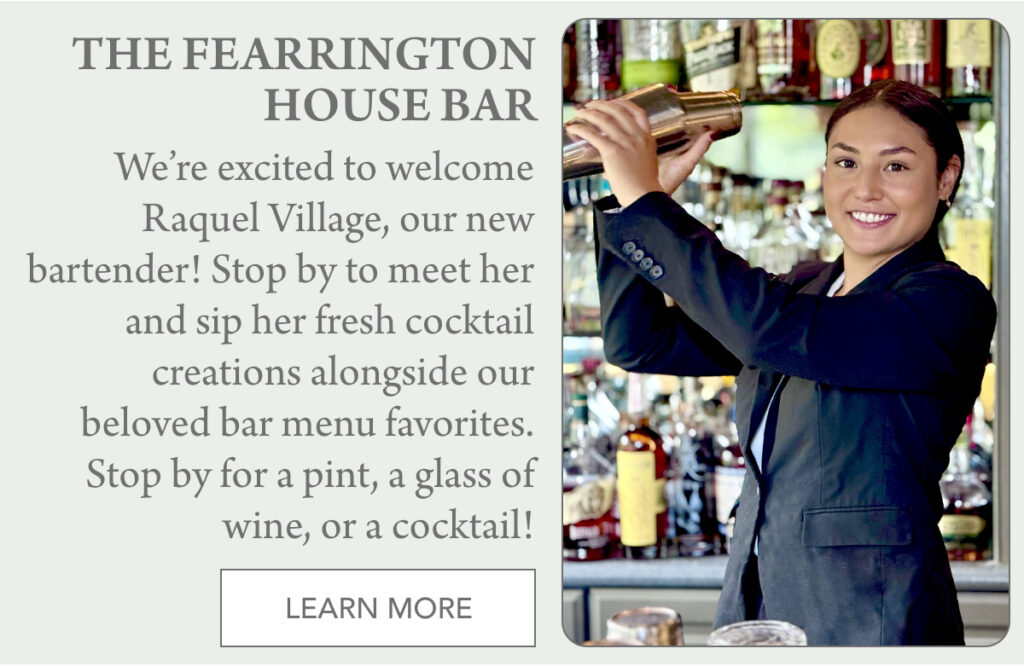 A smiling bartender shakes a cocktail shaker behind a bar stocked with bottles. Text introduces Raquel Village as the new bartender at The Fearrington House Bar and invites guests to meet her and enjoy drinks. "We’re excited to welcome Raquel Village, our new bartender! Stop by to meet her and sip her fresh cocktail creations alongside our beloved bar menu favorites. Stop by for a pint, a glass of wine, or a cocktail!" Fearrington Village