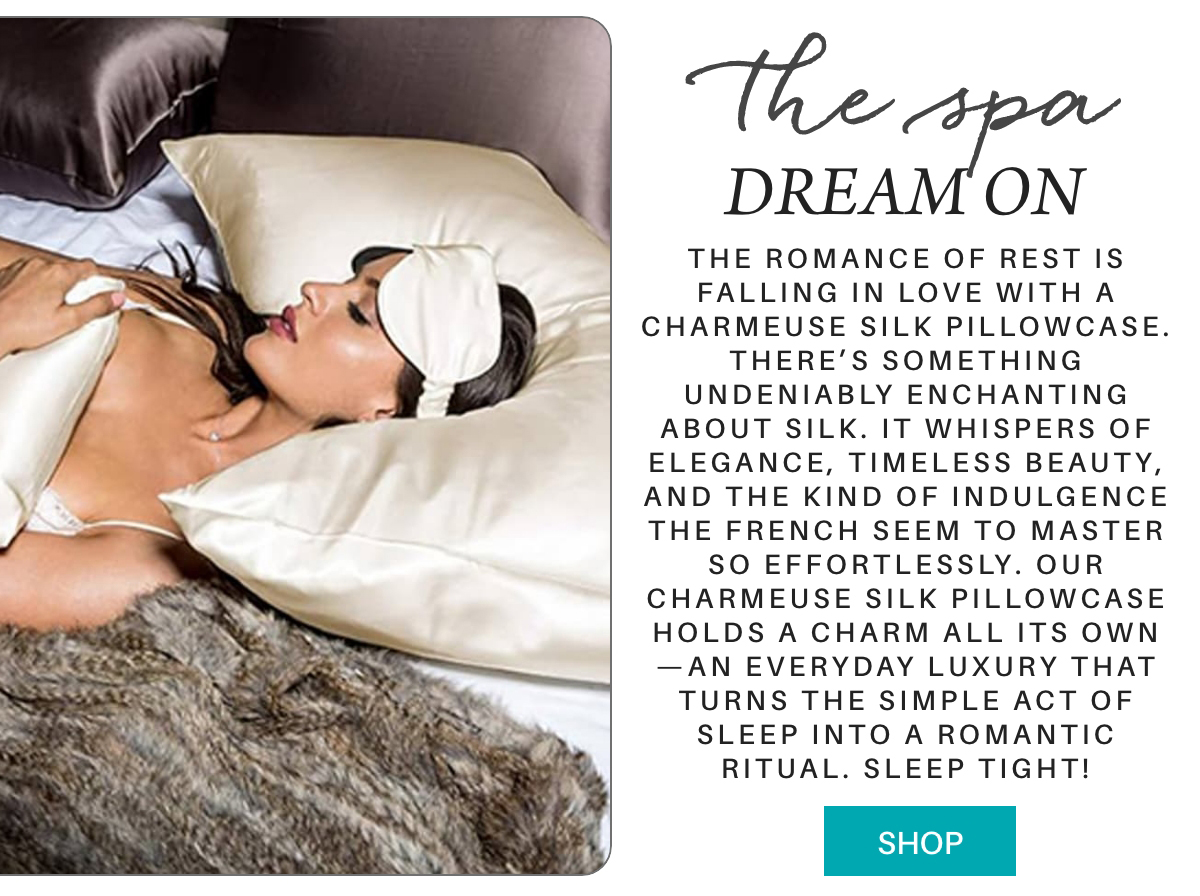 A woman wearing a satin eye mask and white lingerie relaxes on a bed with luxurious silk pillows and a faux fur blanket. Text beside her describes the elegance and allure of a silk pillowcase for restful sleep. "The romance of rest is falling in love with a Charmeuse Silk Pillowcase. There’s something undeniably enchanting about silk. It whispers of elegance, timeless beauty, and the kind of indulgence the French seem to master so effortlessly. our charmeuse silk pillowcase holds a charm all its own—an everyday luxury that turns the simple act of sleep into a romantic ritual. sleep tight!" Fearrington Village