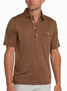 A man wearing a brown short-sleeve polo shirt with a buttoned chest pocket, standing against a plain white background. Fearrington Village
