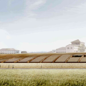 A wide, modern building with a curved, segmented roof sits in a grassy field, with several people walking in front of it and traditional-style buildings with tiled roofs visible in the background under a partly cloudy sky. Fearrington Village