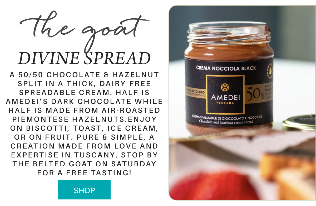 A jar of Amedei Crema Nocciola Black chocolate hazelnut spread sits on a table next to sliced bread. Text beside the image describes the spread as dairy-free and made with chocolate and Piemonte hazelnuts. "A 50/50 chocolate & hazelnut split in a thick, dairy-free spreadable cream. Half is Amedei’s Dark Chocolate while half is made from air-roasted Piemontese Hazelnuts.enjoy on biscotti, toast, ice cream, or on fruit. Pure & simple, a creation made from love and expertise in Tuscany. stop by the belted goat on saturday for a free tasting!" Fearrington Village