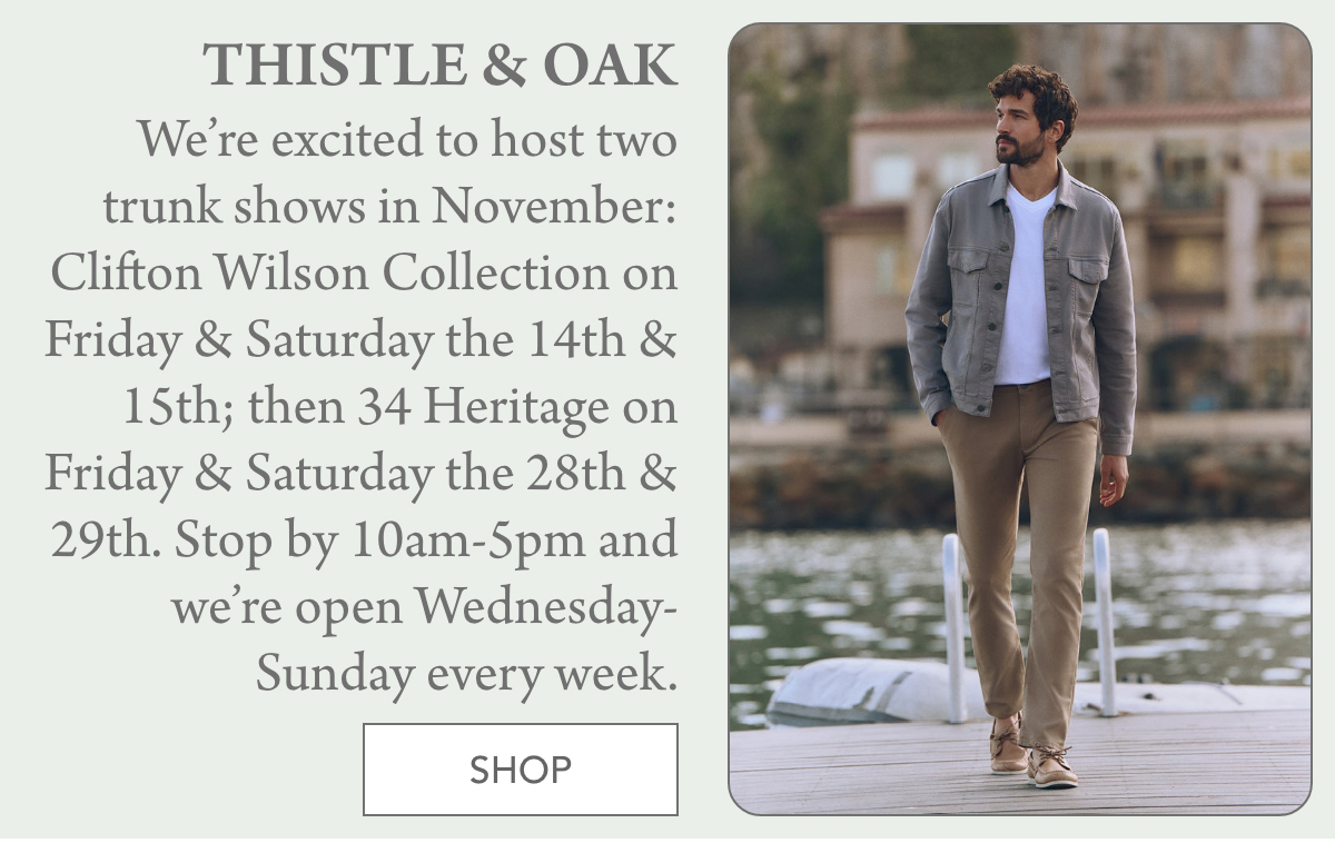 A promotional graphic for Thistle & Oak shows a man in a grey jacket and khaki pants walking outdoors. Text announces trunk shows on November 14-15 and 28-29, 10am-5pm, with shop open Wednesday-Sunday. A "Shop" button appears below. Fearrington Village "We’re excited to host two trunk shows in November: Clifton Wilson Collection on Friday & Saturday the 14th & 15th; then 34 Heritage on Friday & Saturday the 28th & 29th. Stop by 10am-5pm and we’re open Wednesday-Sunday every week."