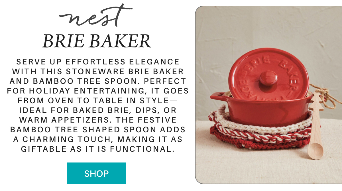 A red stoneware brie baker with lid and a bamboo spoon sits on a cream and red knitted trivet next to a description of the product and a teal “Shop” button. Fearrington Village "Serve up effortless elegance with this Stoneware Brie Baker and Bamboo Tree Spoon. Perfect for holiday entertaining, it goes from oven to table in style—ideal for baked brie, dips, or warm appetizers. The festive bamboo tree-shaped spoon adds a charming touch, making it as giftable as it is functional."